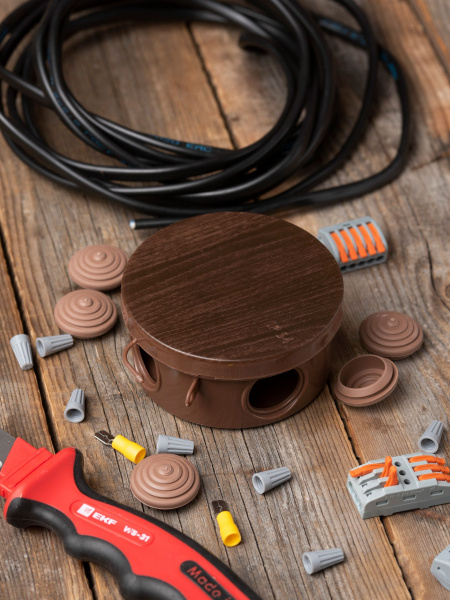 EKF PROxima Коробка распаячная КМР-040-039 с крышкой (85х40) 4 мембранных ввода тёмное дерево IP54