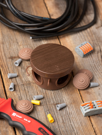 EKF PROxima Коробка распаячная КМР-040-038 с крышкой (65х40) 4 мембранных ввода тёмное дерево IP54